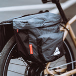 Load image into Gallery viewer, Aventon Rear Rack Close Up Lifestyle Shot
